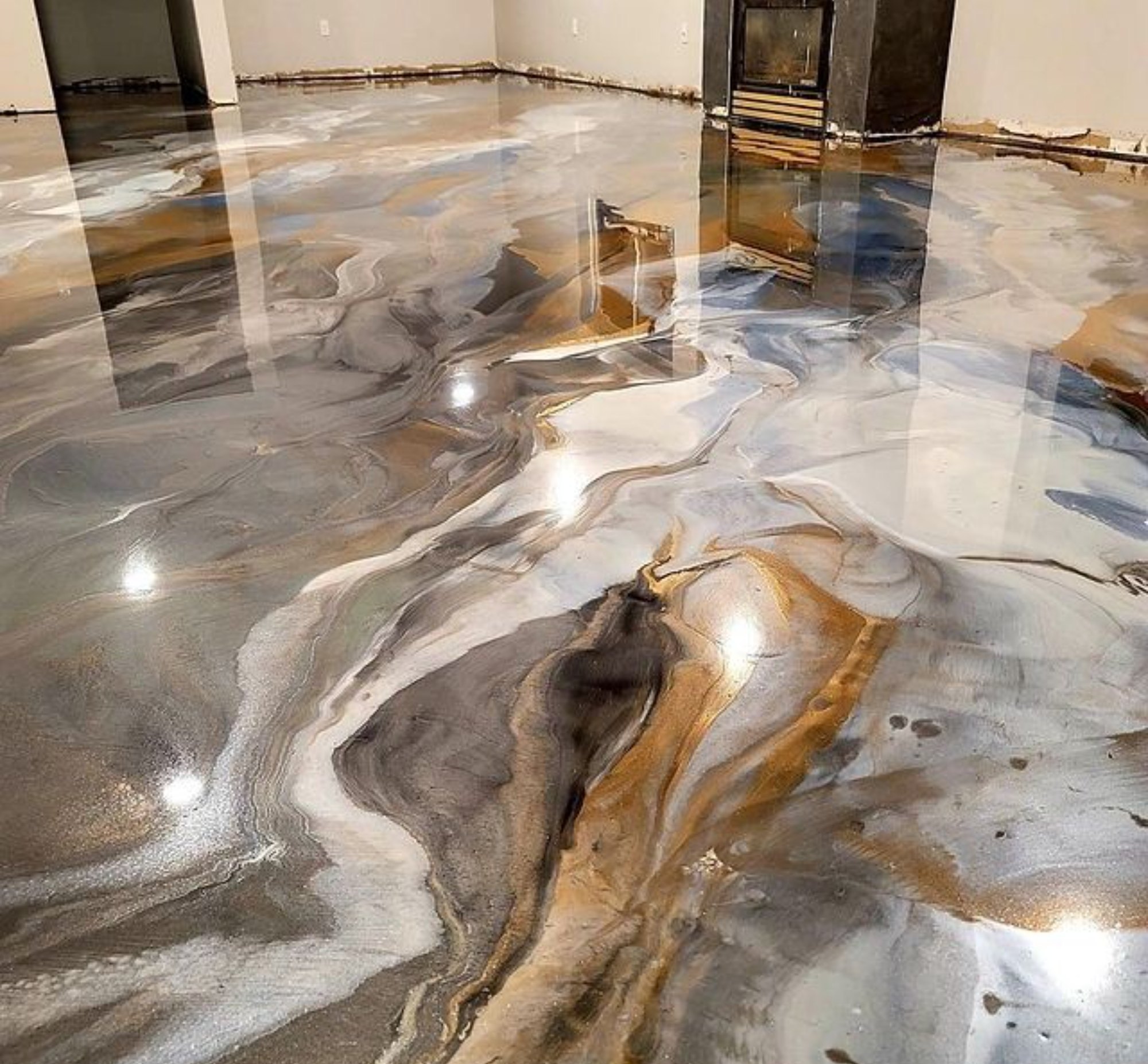 Seamless metallic epoxy floor in a commercial building