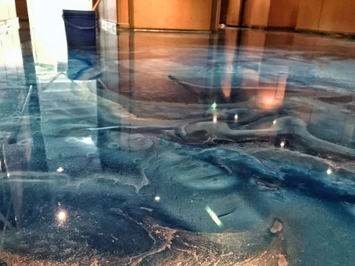 High-gloss decorative 3D epoxy floor in a residential kitchen
