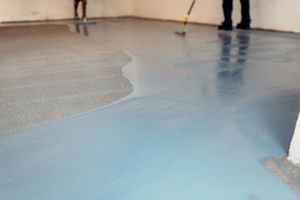 Epoxy floor repair on a damaged industrial factory floor